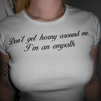 dont get horny around me i'm an empath crop top